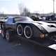 Illustration for article titled This Zany Discount Batmobile Has Eight Wheels And Dual Mazda Rotary Engines